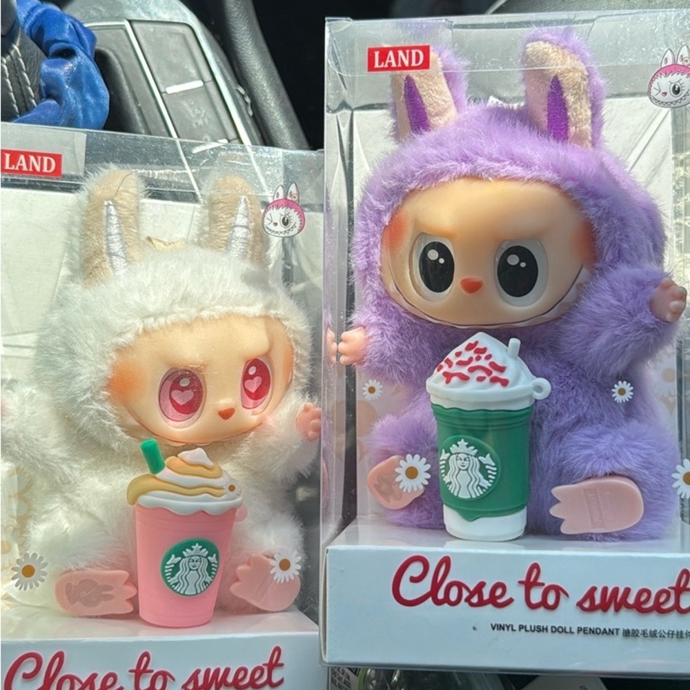 White fuzzy keychain with drink